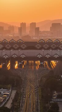 Sunset at Suzhou Railway Station: High-Speed Train Arrival and Departure Time Lapse