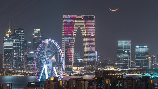 Moonset Time-lapse Over The Gate of the Orient and Suzhou Eye Ferris Wheel, Suzhou Industrial Park, Jiangsu, China