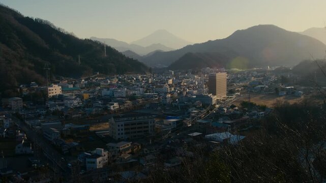 Tourism concept shot of Otsuki city under Mount Fuji peak.