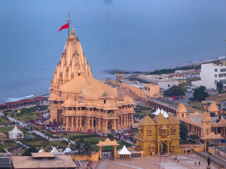 Sacred view of the historic Somnath Temple located on the coast of the Arabian Sea in Gujarat. This iconic Hindu temple is the first of the twelve sacred Jyotirlingas dedicated to Lord Shiva. © Manvendra