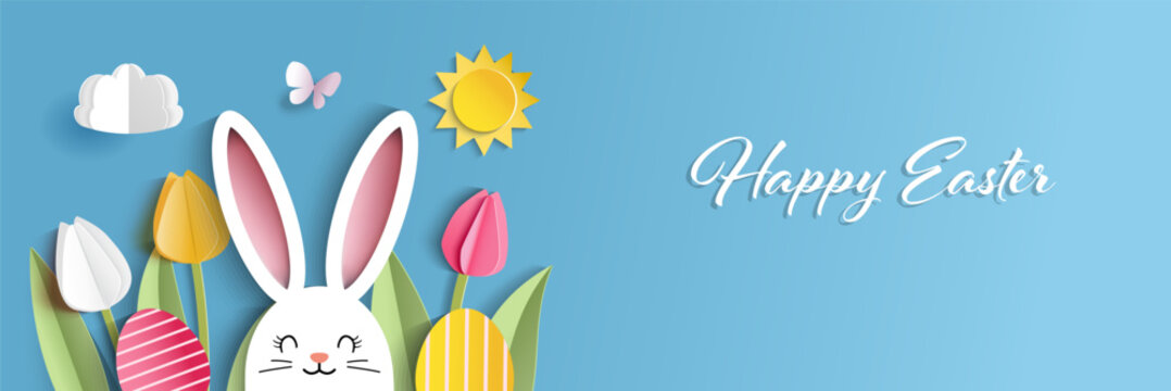 Happy Easter banner template with bunny, eggs, flowers, green grass  and blue sky in  paper cut style. Vector illustration