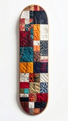 Artistic Colorful Patchwork Quilted Skateboard Deck Against White Background