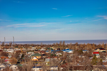 Obraz premium Landscape, mountain, trees, snow, city, winter, river, stream.