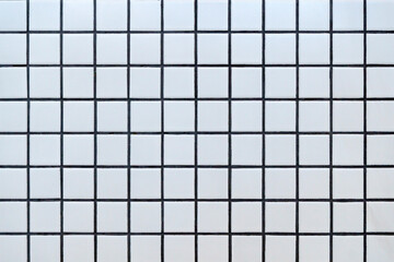 White ceramic tile background. Old vintage ceramic tiles in white to decorate the kitchen or bathroom 