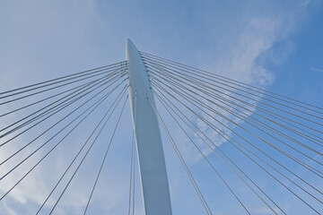 Architecture detail of Prins Clausbrug,cable-stayed bridge , low angle view on a cloudy sky. Utrecht,The Netherlands 