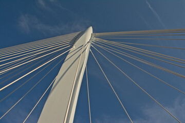 Architecture detail of Prins Clausbrug,cable-stayed bridge , low angle view on a cloudy sky. Utrecht,The Netherlands 
