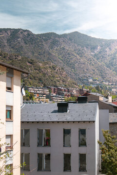 Residential buildings and Pyrenees mountains in Andorra la Vella Old town on a sunny day