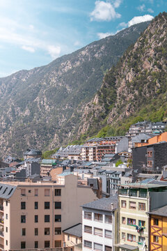 Residential buildings and Pyrenees mountains in Andorra la Vella Old town on a sunny day