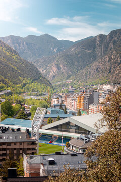 Residential buildings and Pyrenees mountains in Andorra la Vella Old town on a sunny day