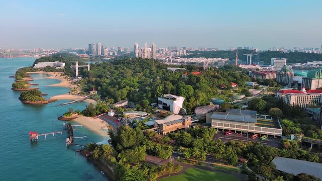 Sentosa Island, Singapore: Aerial view of Palawan Beach on famous island resort, tropical white sand, lush greenery - landscape panorama of Southeast Asia from above
