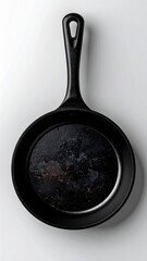 Cast Iron Skillet Top View on White Table Black Color and Rust Marks