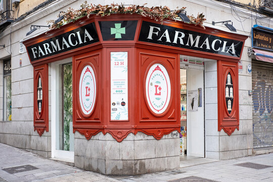 Madrid, Spain, January 16, 2024: Facade and entrance to the beautiful pharmacy in Lavapies