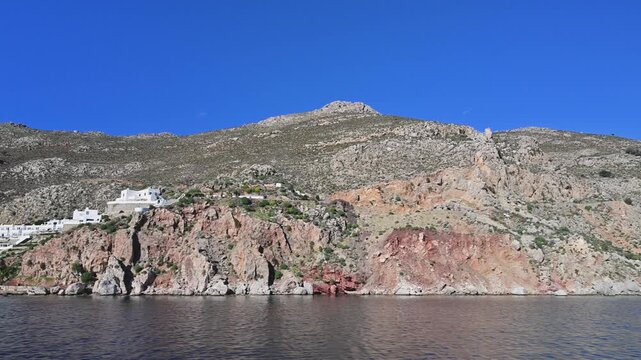 White Buildings on Hillside Landscape on Tilos Island, Greece