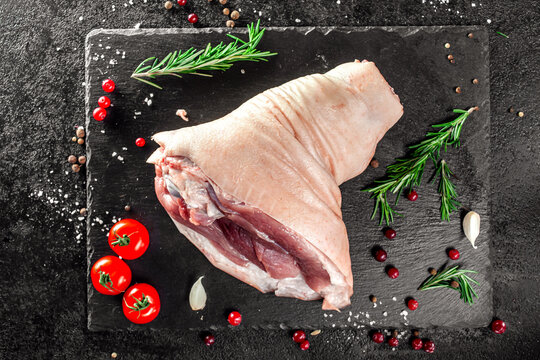 Raw pork knuckle on slate board