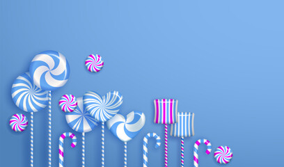 Candies and lollipops on blue background