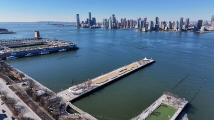 Naklejka premium Downtown New York In Manhattan New York United States. Birds Eye View Of Stunning Cityscape With Streets And Buildings. Metropolitan Skyline Panoramic City View Stunning.