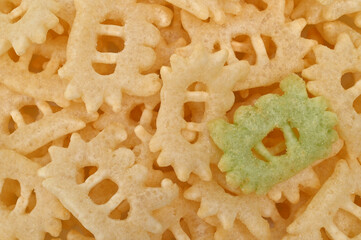 Crab chips in the form of crabs, for backgrounds or textures