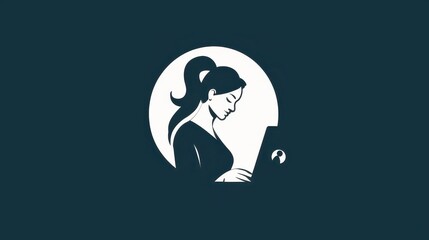 Woman working on laptop with focused expression in modern workspace