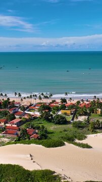 Calcanhar Lighthouse At Touros Rio Grande Do Norte Brazil. Birds Eye View Of Lighthouse Standing Tall Against The Blue Sky. Shore Horizon Beach Sea. Seaside Panorama. Touros Rio Grande do Norte.