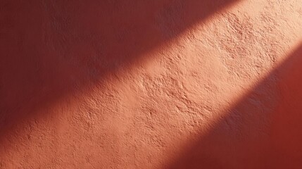 Fototapeta premium Close-up of a textured surface. the surface appears to be made of a reddish-orange material, possibly clay or plaster.