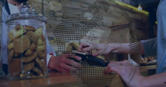 Barista holding terminal while customer tapping card, completing cafe sale with dotted overlay