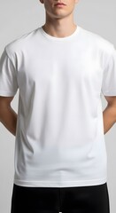 Image of a white shirt on a fair skin toned male, hands behind the back. 