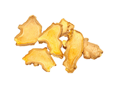 Sliced dried ginger root pieces with rough texture and light yellow interior isolated on a transparent background