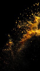 Fototapeta premium Golden Powder Explosion Against a Dark Background in Studio Shot