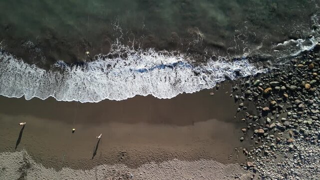 Taurito - Gran Canaria - Wyspy Kanaryjskie - Hiszpania - piękna plaża, zach&oacute;d słońca na d oceanem nagrane dronem