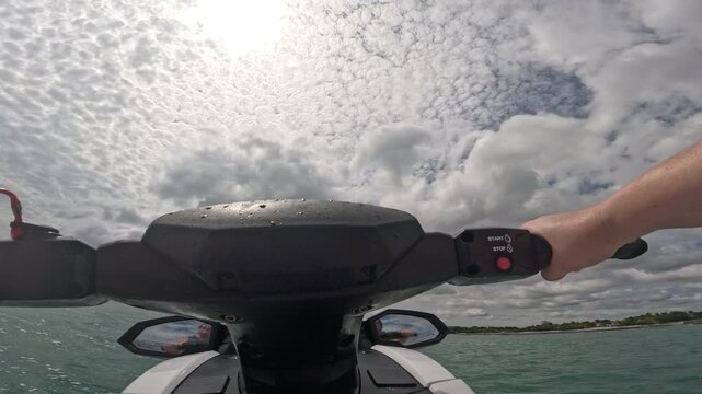 Riding personal watercraft on the shores of Rio Hato in Panama on vacation fun ocean play