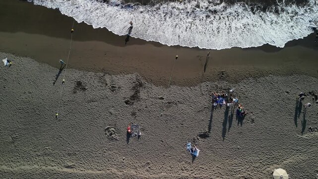 Taurito - Gran Canaria - Wyspy Kanaryjskie - Hiszpania - piękna plaża, zach&oacute;d słońca na d oceanem nagrane dronem