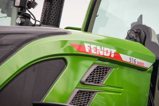 Bednary, Poland - September 25, 2021: Agroshow. Fendt brand tractor machine. Manufacturer agricultural equipment. Detail and part of vehicle