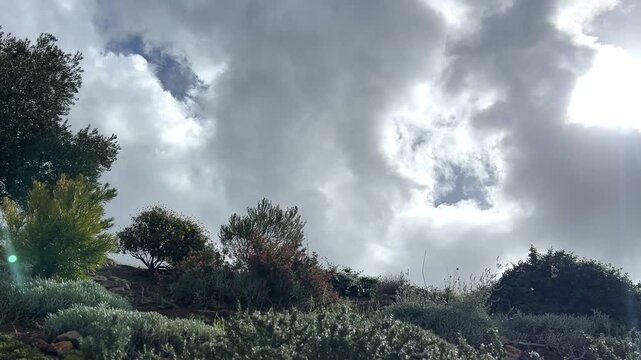 Dramatic Storm Clouds Rolling Over Hillside