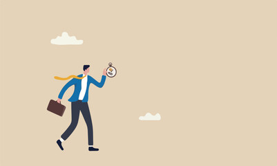 Time running industrial success in business deadline concept, hand holding vintage pocket watch with mechanics, studio shot with dark black background