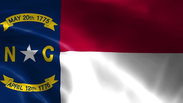North Carolina state flag waving in the wind official emblem with historical dates patriotic symbol for USA