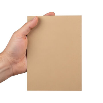 A hand holding a plain brown paper envelope or package