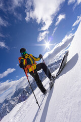 Beautiful Winter Mountain Scenery with Man on Cross-Country Skis