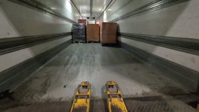 Exiting commercial trailer with metal forks detail