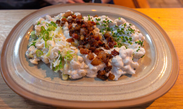 Traditional Bryndzove Halusky dish in Bratislava Slovakia.