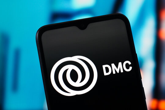 In this photo illustration, DMC Global logo is seen displayed on a smartphone screen.