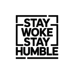 Obraz premium Rectangular graphic frames the uplifting phrase 'Stay Woke Stay Humble' in bold.