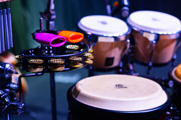 Percussion Setup with Meinl Cowbells, Tambourine, and LP Congas on Stage