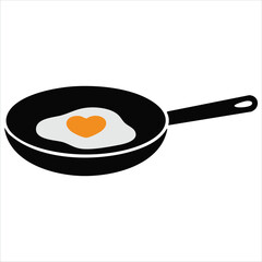 Black frying pan with heart shaped fried egg for cooking with love breakfast concepts