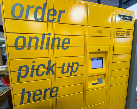 CHESTER, CHESHIRE, ENGLAND - NOVEMBER 03, 2025: Amazon online order pickup lockers for collection in large retail store