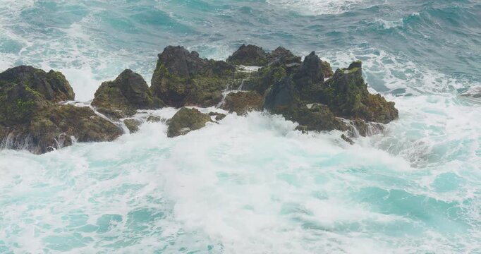 4K video, wild waves crashing against the rocks off the north coast of Madeira.