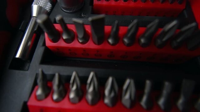Close up shot of a professional tool kit with screwdriver bits and sockets neatly organized