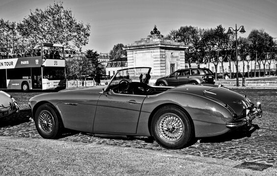 Paris, France - November 18th 2018 : Austin-Healey 3000 (probably a MK1) parked on the street.  Each sunday, an association of cars organise an exhibition in front of the Army Museum, the Invalides.