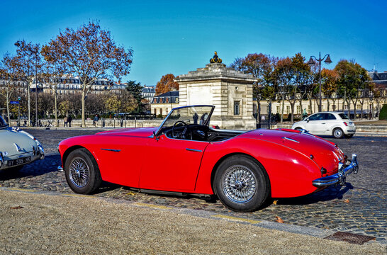 Paris, France - November 18th 2018 : Austin-Healey 3000 (probably a MK1) parked on the street.  Each sunday, an association of cars organise an exhibition in front of the Army Museum, the Invalides.