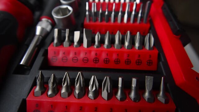 Close up shot of a professional tool kit with screwdriver bits and sockets neatly organized