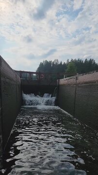 filling an old functioning manual lock in the Augustow Canal in Belarus with water